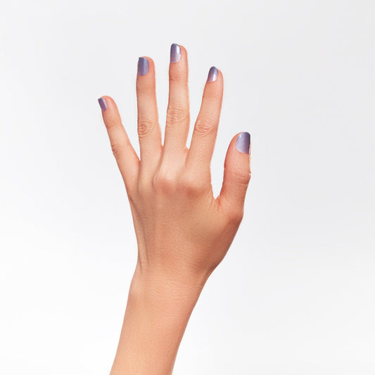 Model's left hand wearing Ardell Nail Addict Nail Strips - Lavender Bliss