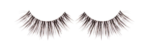 A pair of 3D Faux Mink 862 lashes lay in white color setting