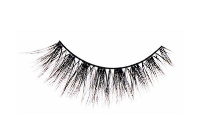 A macro shot of Fauxmink Demi Wispie lashes showing their medium volume & length, flared, crisscross, feathered & curl style