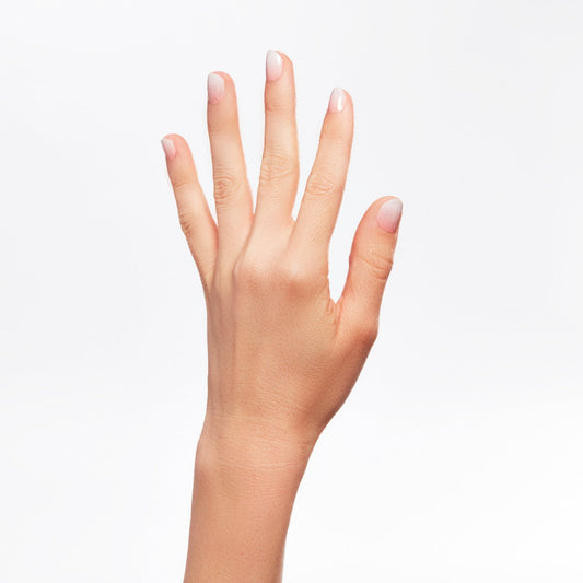 A woman's hand with nail lacquer.