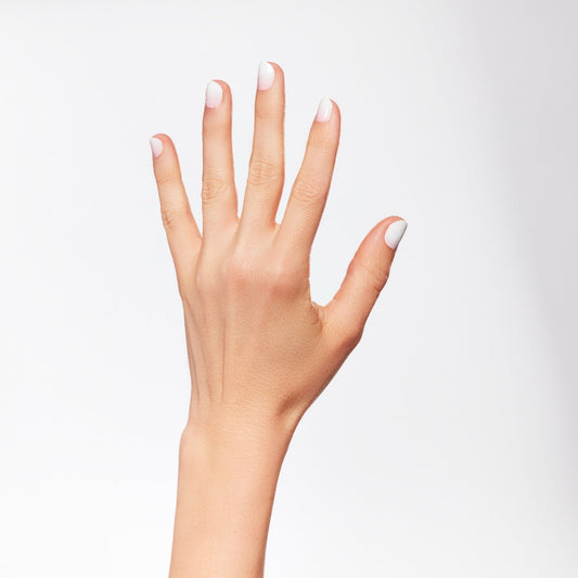 A woman hand using Ardell Nail Addict Gel Nail Strips
