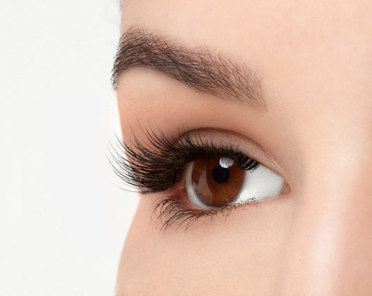 Angled right eye of a model wearing Ardell Pre-Cut Lashes 900 showing its curly & flares faux lash
