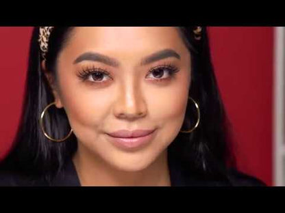 Model Wearing Ardell Lashes & Brows – Woman with voluminous false lashes and defined brows using Ardell products.